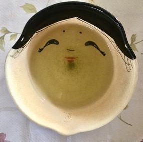 福茶碗。おかめさんの顔